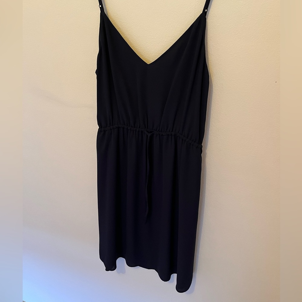 Navy Babaton mini dress. With a small tie for waist definition . Size small.